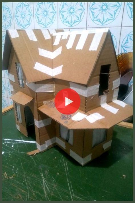 a cardboard house is sitting on the counter