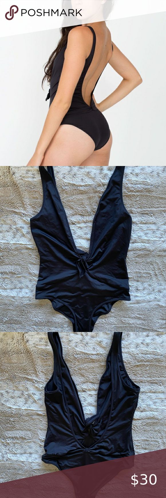 American Apparel Black Plunge One-Piece Swimsuit *Size: SMALL  *80% nylon, 20% elastane *Like-new condition *Super sexy deep plunge swimsuit with low back  Tags:  AA american apparel classic black one-piece swimsuit swim small rare find nwot sale bundle deals discount clothes American Apparel Swim One Pieces Black V-neck Bodysuit For Beachwear, Black V-neck One Piece Beachwear, Black V-neck One-piece For Summer, Black V-neck Summer One Piece, Black V-neck One Piece For Poolside, Black V-neck One Piece With Lined Body, Black V-neck One-piece With Lined Body, Black V-neck One Piece For Summer, Black V-neck One-piece Beachwear