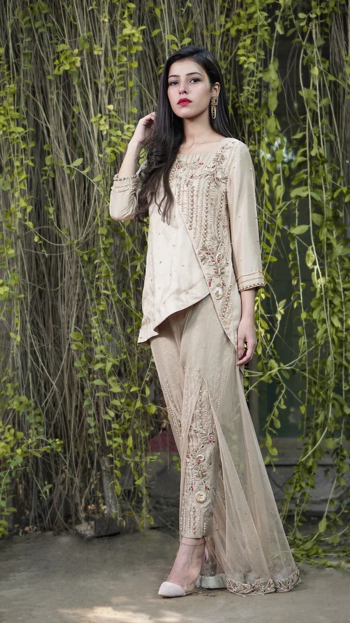 Champagne mauve raw silk shirt with full sleeves, paired seamlessly with jamawar pants. This ensemble epitomizes Pakistani formal dresses, featuring exquisite embroidery and a traditional touch. Explore our collection for designer and luxury formal dresses suitable for special occasions, parties, and elegant evenings. Elevate your style with our range of Pakistani party wear dresses, offering a perfect blend of tradition and sophistication. Find the ideal formal wear dress for women in our curat White Indian Outfit, Casual Bridal Dress, Pakistani Party Wear Dresses, Trendy Party Dresses, Pakistani Formal Dresses, Pakistani Party Wear, Womens Trendy Dresses, Tunic Designs, Pakistani Wedding Outfits