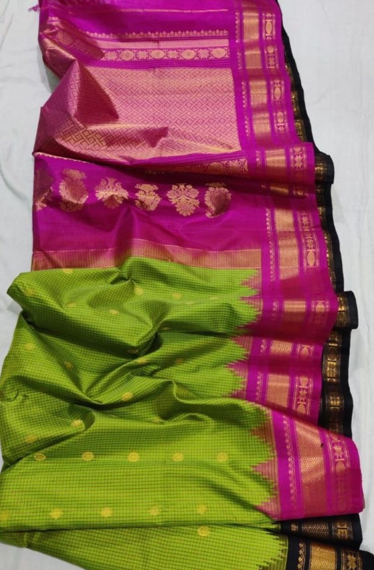 Exclusive pure Handloom Gadwal silk saree with Ganga Jamuna border. This is a beautiful parrot green saree with magenta and black borders . The saree is very unique and can be worn in any party. Green lover's don't think twice, it's hard to find this pattern. DesiModel is committed to bring you the best quality and design. Parrot Green Saree, Black Borders, Parrot Green, Green Saree, Pure Silk Sarees, Beautiful Saree, It's Hard, Personalized Card, Silk Saree