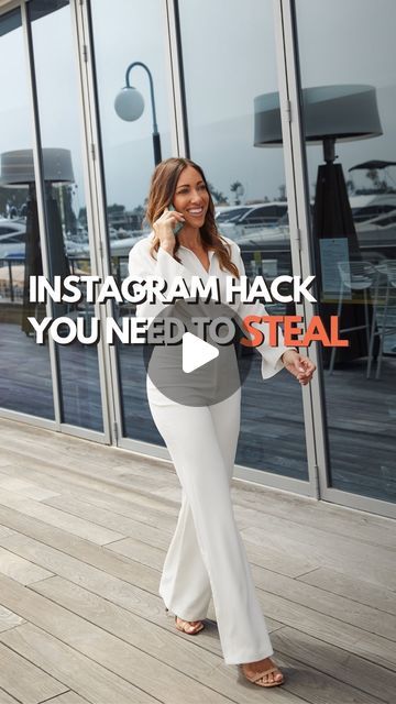 a woman talking on her cell phone while standing in front of a building with the words instagram hack you need to steal