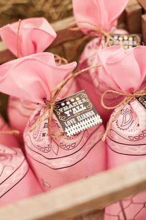 pink shoes are wrapped in twine and tied with string to give them as gifts