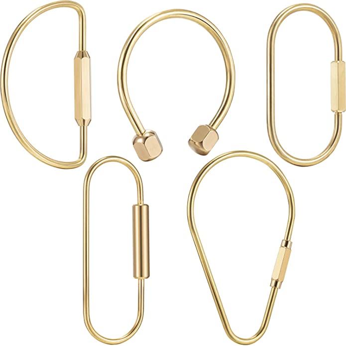 four pairs of gold metal ear hooks on a white background with clippings for each hook