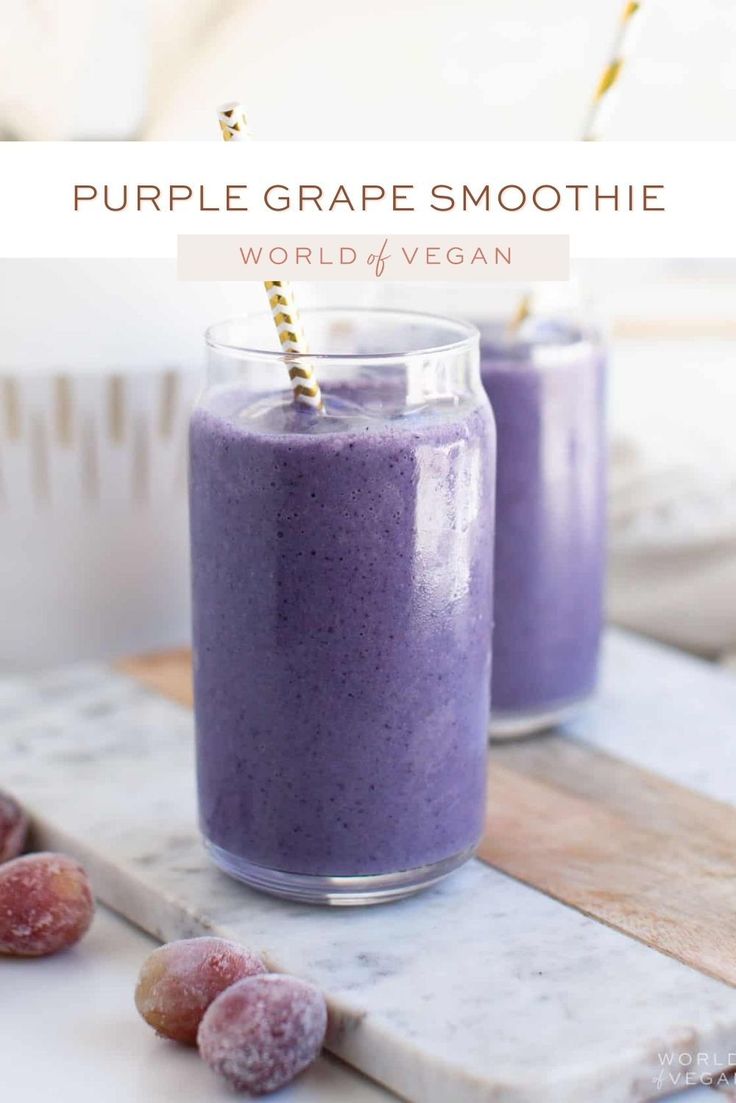 two glasses filled with purple smoothie on top of a table