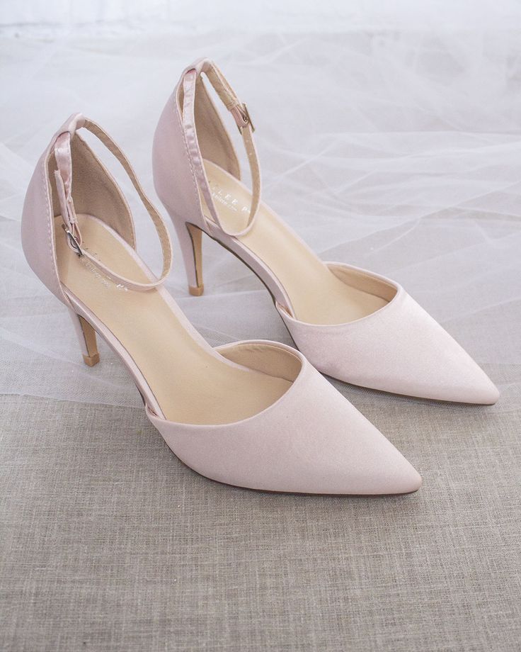 An all-time classic and elegant style evening shoe with simplicity of satin pointy toe heels and removable ankle strap. Perfect wear for bridesmaids shoes, prom shoes, holiday parties, or any other special events. Available in 10 colors. DETAILS: HEELS: 3 inches COLORS AVAILABLE: Black, Burgundy, Champagne, Dusty Pink, Light Blue, Ivory, Silver, Hunter Green, Red and White UPPER: Synthetic upper and lining MATERIALS: Manmade outsole ORIGIN: Imported STYLE NAME: BELL Quinceanera Heels, 2022 Shoes, Quinceanera Shoes, Graduation Shoes, Hoco Inspo, Bridesmaids Shoes, Heels With Ankle Strap, Simple Satin, Pencil Heels