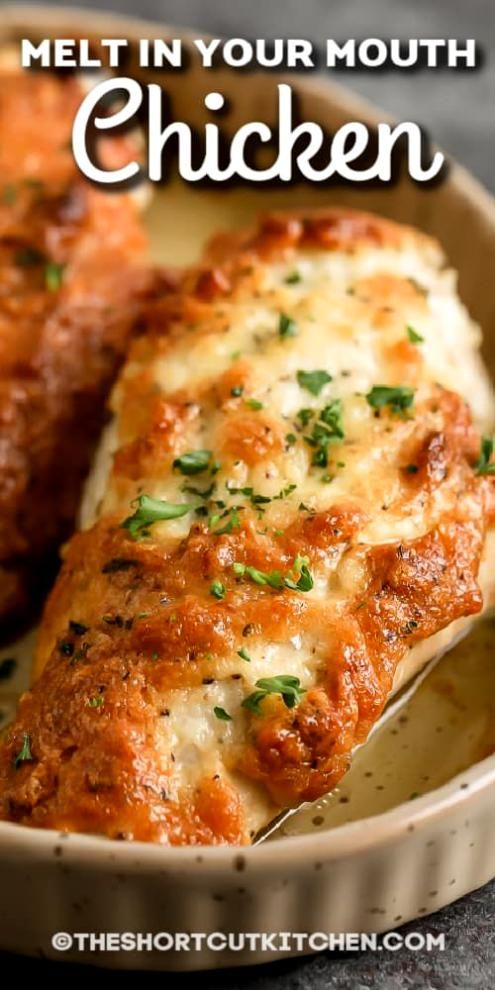 chicken parmesan in a casserole dish with text overlay that reads melt in your mouth chicken