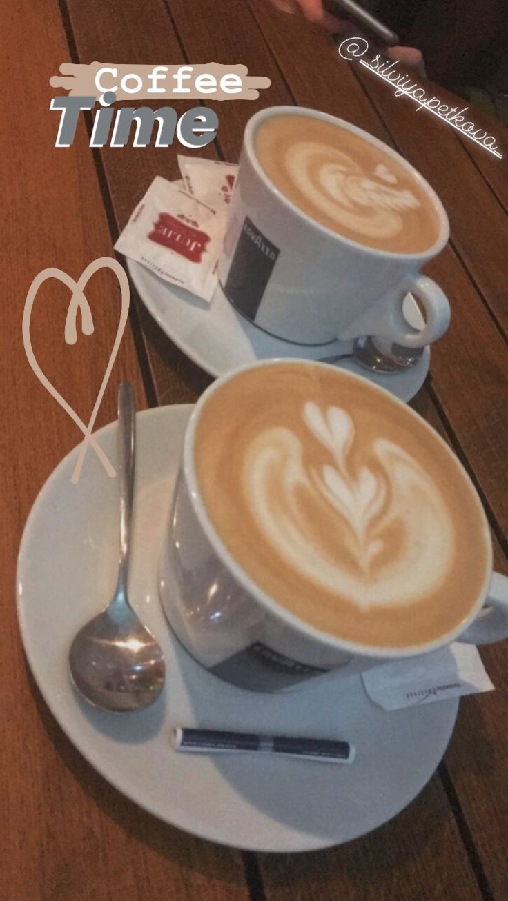 two cups of coffee sitting on top of a white plate