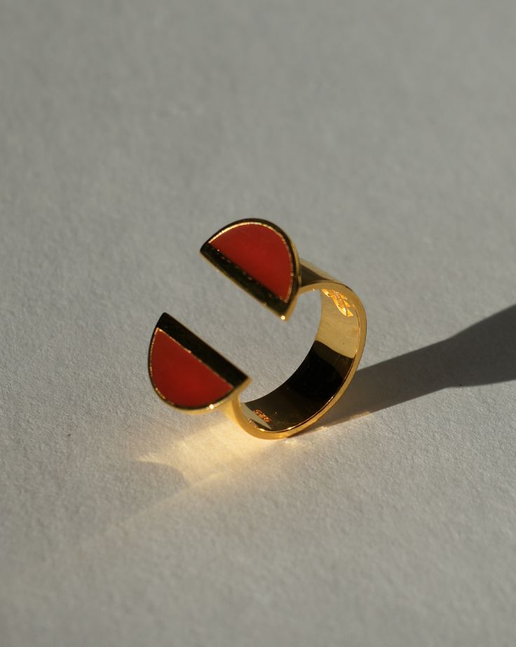 Indulge in elegance with our 24 K Gold Vermeil Split Top Crescent Carnelian Enamel Ring, a captivating piece from the Diasporan Voyage Collection. Crafted in collaboration with Chee Lee Designs, this ring features a unique split top design in 24K Gold Vermeil , adorned with lustrous crescents in Carnelian enamel. This ring is a statement of modern style interwoven with the rich tapestry of African heritage. Experience the fusion of luxury and cultural significance with this timeless addition to Crescent Ring, Split Top, African Heritage, Hair Remedies, Nail Studio, Enamel Ring, Face Hair, Top Design, Kids Gifts