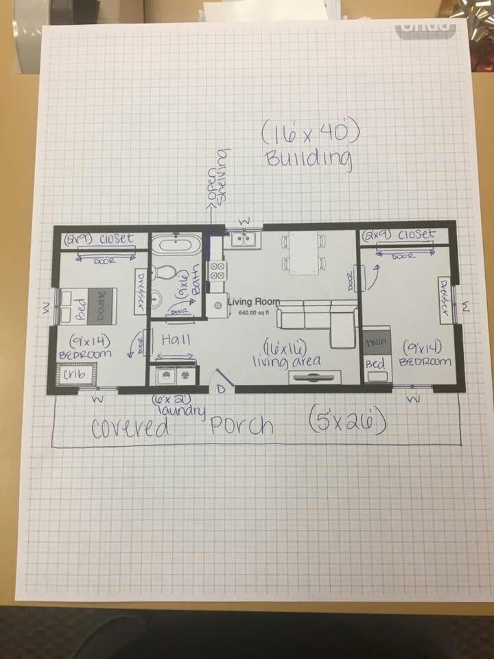 a floor plan for a house on top of a piece of paper with some writing