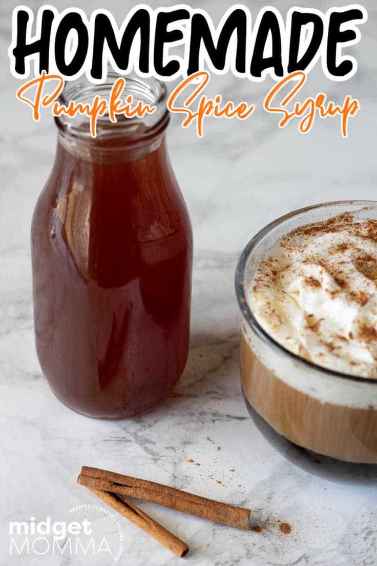 homemade pumpkin spice syrup in a glass jar next to cinnamon sticks