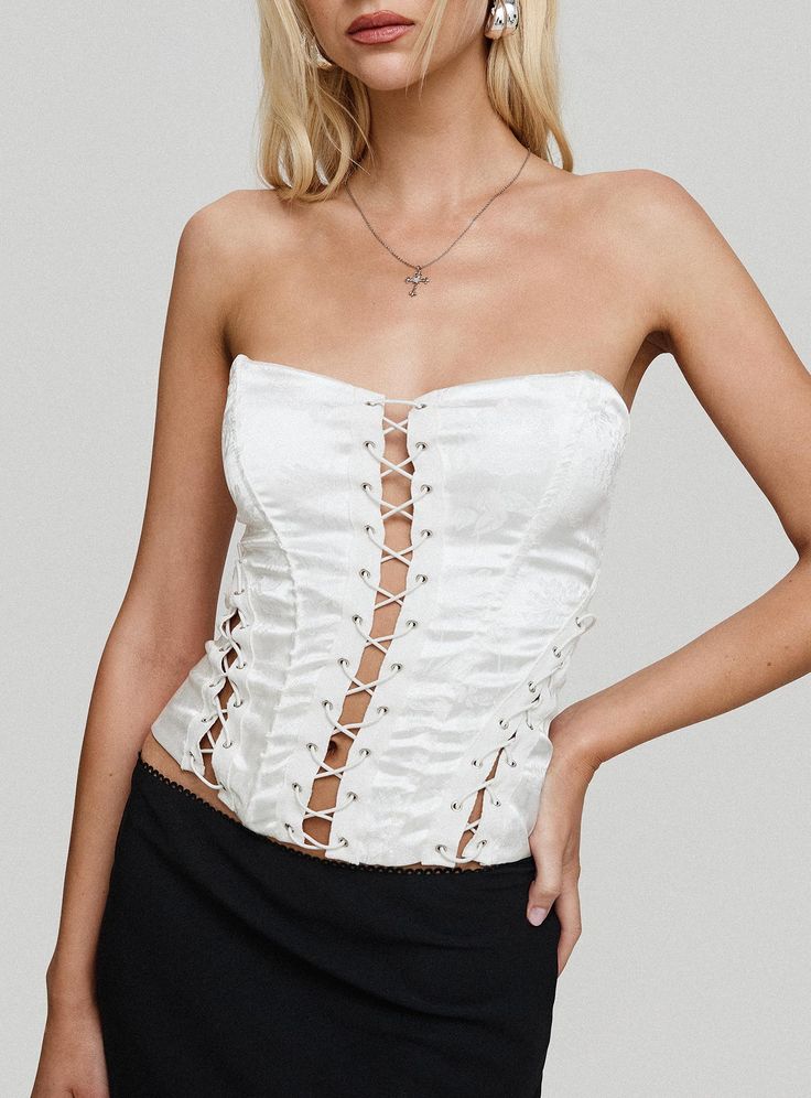 Corset top Sweetheart neckline, split hem with cross fastening, zip fastening at back, crop fitting Non-stretch material, partially lined Main: 100% polyester, Lining: 95% polyester 5% elastane Cold hand wash Buy Now Pay Later, Split Hem, Corset Top, Princess Polly, Mochi, Sweetheart Neckline, Split, Hand Wash, White