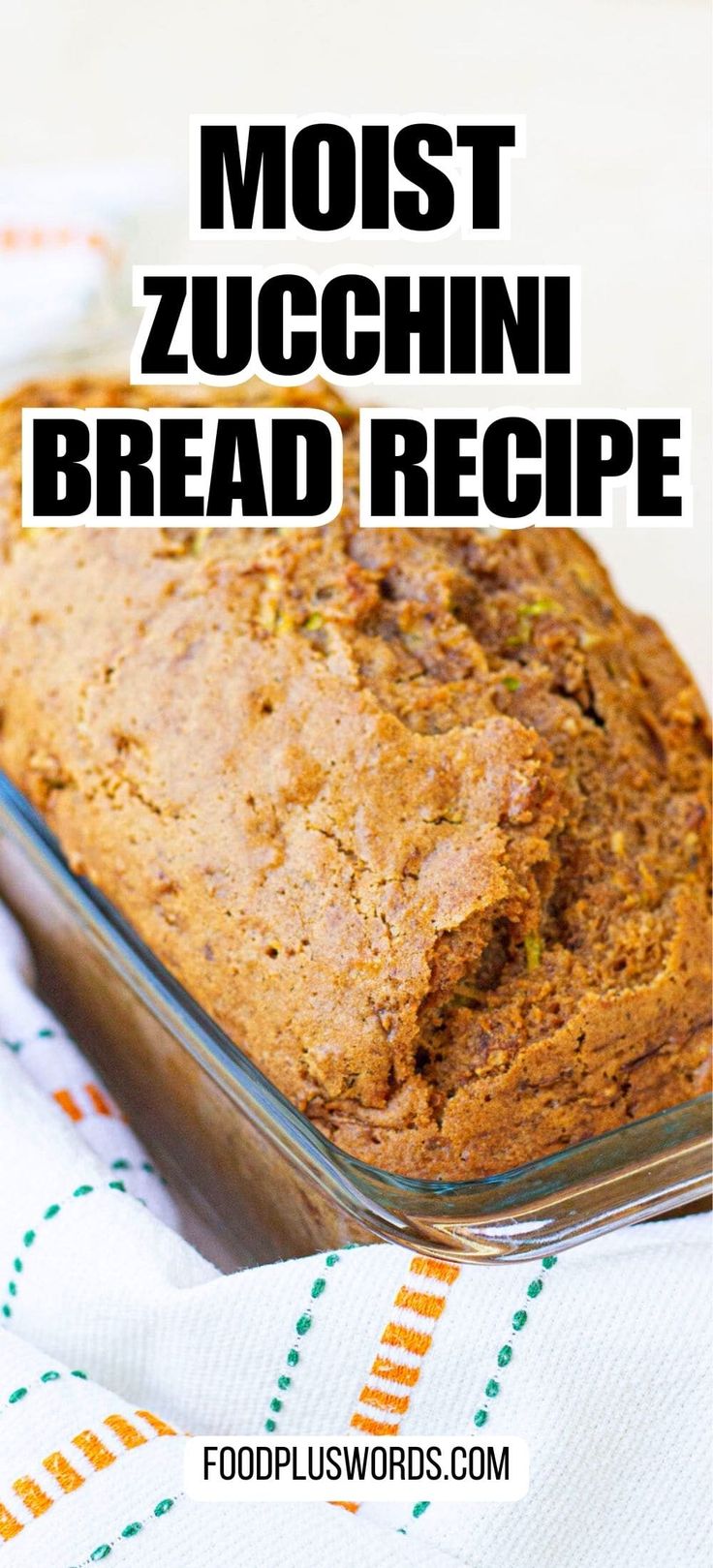 a loaf of zucchini bread in a glass baking dish with the words, most zucchini bread recipe