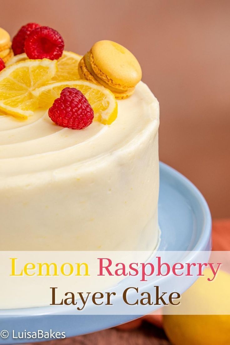 a lemon raspberry layer cake on a blue plate