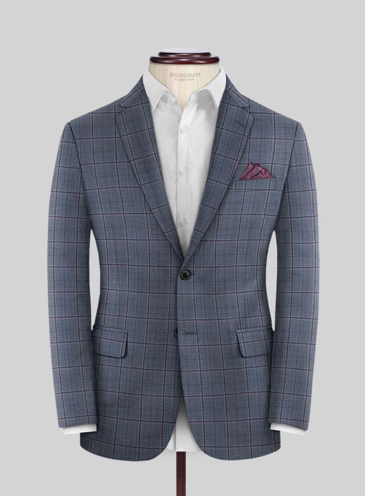 Put together a dapper and stylish formal look by wearing our Reda Tropical Blue Checks Wool Suit. Made from high-quality wool that feels exceptionally soft and has a lightweight finish. The subtle checkered texture created with brown threads and a classy tropical blue color palette makes this suit a standout choice for any glamorous event or an important meeting. Rest assured that this ensemble will set you apart. 
  Look Includes    Reda     Tropical     Blue     Checks     Wool  Fabric  Two Bu Tailored Plaid Suits For Business Casual, Dapper Business Blazer In Suiting Fabric, Tailored Plaid Suits For Business, Fitted Plaid Blazer For Business, Plaid Fitted Blazer For Business, Plaid Notch Lapel Suit For Formal Occasions, Tailored Plaid Suits For Office, Plaid Suits For Semi-formal Occasions, Business Plaid Suit With Suit Collar