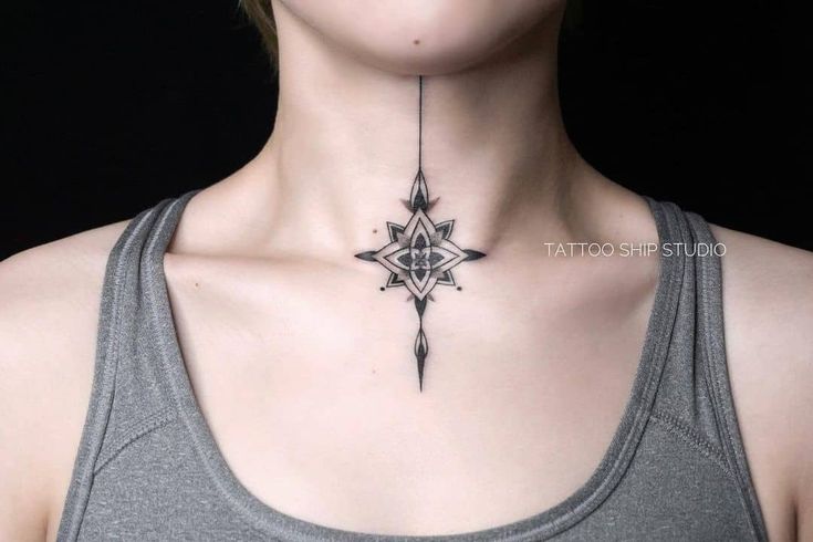 a woman with a tattoo on her neck