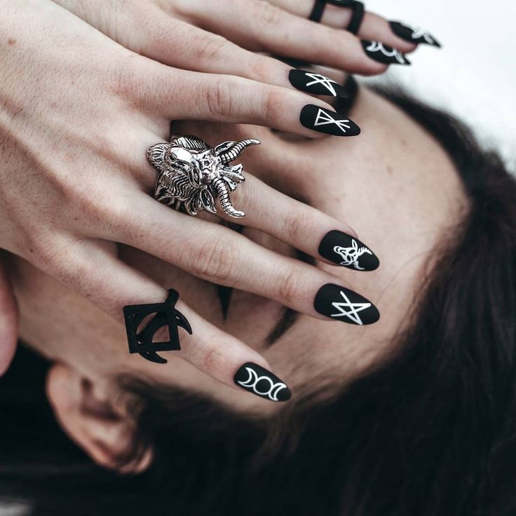 The Bad Witch Nailz is witchy AF. They're a matte black, almond shape with rune designs on each claw. 24 nails are included - a full range of sizes. Nail glue and a nail file is included with all Nailz Rune Nails, Ongles Goth, Stiletto Press On Nails, Unicorn Nail Art, Short Stiletto, Dark Gothic Art, Black Stiletto Nails, Witch Nails, Sharp Claws