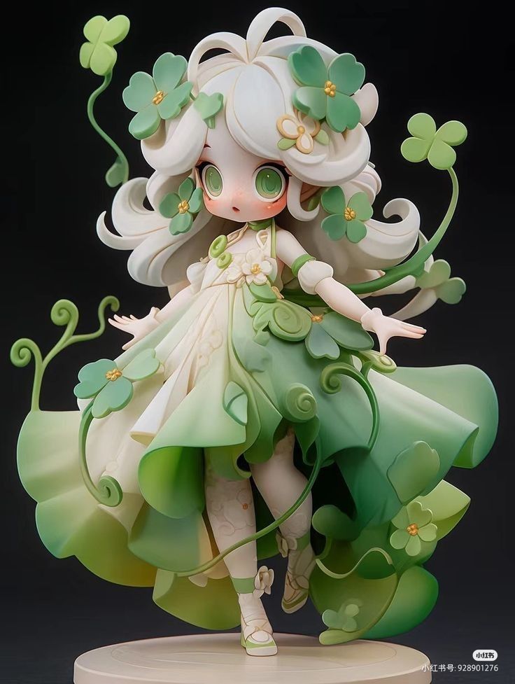 a green and white figurine is standing on a stand with four leaf clovers