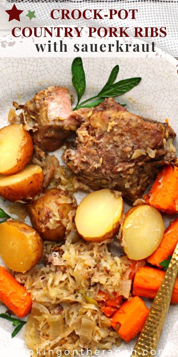 a white plate topped with meat, potatoes and carrots next to a gold fork