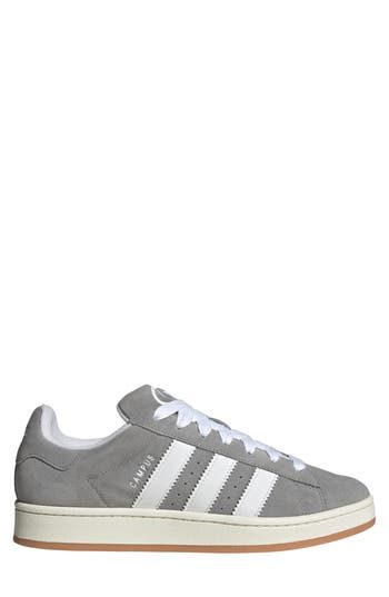 A low, padded collar and wide base nod to the skater and hoopster heritage of a sneaker sporting the streamlined profile that's kept it a perennial favorite. Lace-up style Removable insole Leather upper/textile lining/rubber sole Imported Adidas Sporty Platform Sneakers For Streetwear, Sporty Adidas Platform Sneakers For Streetwear, Adidas Low-top Skate Shoes, Adidas Low-top Skate Shoes With Vulcanized Sole, Adidas Mid-top Skateboarding Sneakers, Adidas Mid-top Sneakers For Skateboarding, Adidas Low-top Sporty Skate Shoes, Adidas Sporty Low-top Skate Shoes, Sporty Adidas Low-top Skate Shoes