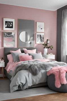 a bedroom with pink walls and grey bedding