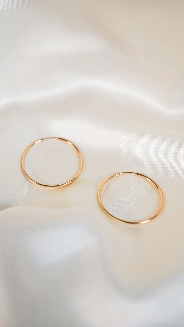 * Earring Material: 14K Yellow Gold * Earring Width: 1.5 Inch Hoop, 2 MM Width * Stone Weight & sizes: N/A * Overall weight: 3.5g * Earring material: 14k yellow gold, Wire Backing Classic 14k Gold Filled Hoop Earrings For Anniversary, Classic Small Hoop Halo Jewelry, 14k Gold Filled Hoop Jewelry For Formal Occasions, Formal 14k Gold Filled Hoop Earrings, Formal 14k Gold Filled Hoop Jewelry, 14k Gold Filled Round Hoop Earrings For Formal Occasions, Formal 14k Gold Filled Round Hoop Earrings, Polished 14k Gold Filled Hoop Earrings, Classic Gold Huggie Earrings With Halo