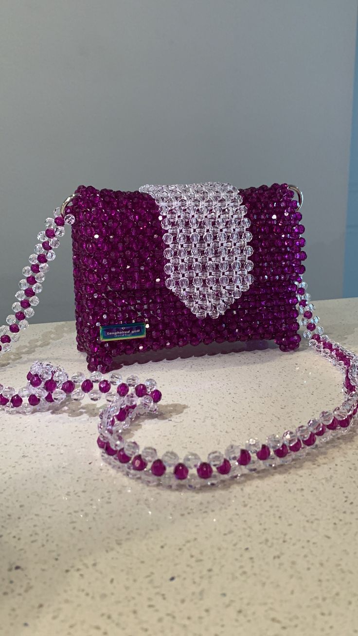 100% handmade beads bag. Great for a gift, going out to events or just evereday use. Casual Beaded Bags At Cheap Price, Cheap Beaded Shoulder Bag For Events, Purple Beaded Bags For Gifts, Purple Beaded Bag As Gift, Purple Beaded Bag For Gift, Luxury Beaded Clutch Shoulder Bag, Luxury Beaded Shoulder Bag For Fashion, Handmade Purple Shoulder Bag For Party, Beaded Rectangular Shoulder Bag For Formal Occasions