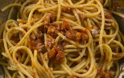 pasta with meat and sauce in a skillet