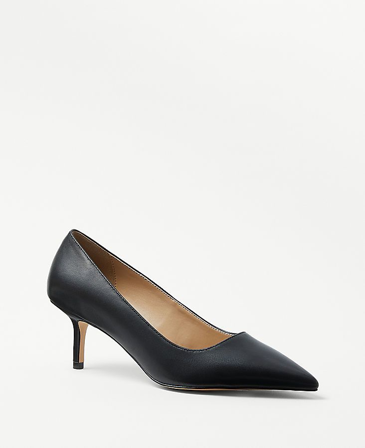 Step into elegance with the Ann Taylor Daphne Leather Pumps, where classic style meets modern refinement. These pumps are designed to enhance your ensemble with their sleek, updated silhouette featuring a longer, pointy toe and a more subtle curve at the heel.

- Size: 7
- Color: Black
- Material: Leather
- Gender: Female
- Heel Height: 2 1/2 inches

Crafted for comfort and style, the Daphne Pumps include a padded footbed ensuring you can wear them from day to night with ease. Perfect for both p Sleek Pointed Toe Kitten Heels, Sleek Kitten Heels For Office, Classic Black Kitten Heels With Reinforced Heel, Classic Fitted Leather Kitten Heels, Classic Black Kitten Heels, Sleek Pointed Toe Court Shoes With Reinforced Heel, Sleek Leather Kitten Heels Medium Width, Sleek Black Kitten Heels With Branded Heel Counter, Sleek Court Shoes With Reinforced Heel And Pointed Toe