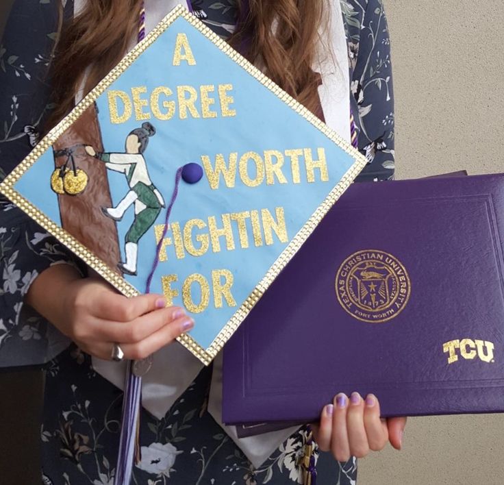 a woman holding a purple and blue graduation cap with the words a degree worth within it