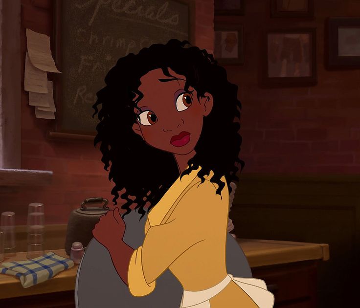 an animated image of a woman with curly hair in a kitchen looking off to the side