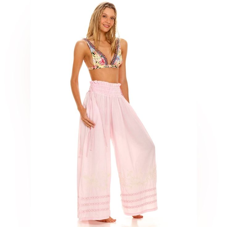 Nwt Agua Bendita Tatum Pants - Brand New In Packaging. Multiple Sizes These Easy, Wide-Legged Pants Are Versatile And Relaxed, With Adjustable Ties At The Waist That Ensure A Perfect Fit. The Handcrafted Details And Styling Add A Unique Touch, While The Comfortable Fabric Makes Them An Excellent Choice For Everything From Lounging At Home To Running Errands To A Night Out On The Town. Machine Embroidered Smocked Waist Adjustable Straps Our Model Is Wearing A Size Small. Height: 70" / 176 Cm. Bus White Beachwear Pants With Elastic Waistband, Bohemian Harem Pants For Beach Season, Loosely Fitted Full-length Beach Bottoms, Wide Leg Parachute Pants For Summer Vacation, Summer Vacation Wide-leg Parachute Pants, White Bohemian Yoga Pants, White High Waist Harem Pants For Vacation, High Waist Parachute Pants For Summer, Pink Full-length Bottoms For Vacation