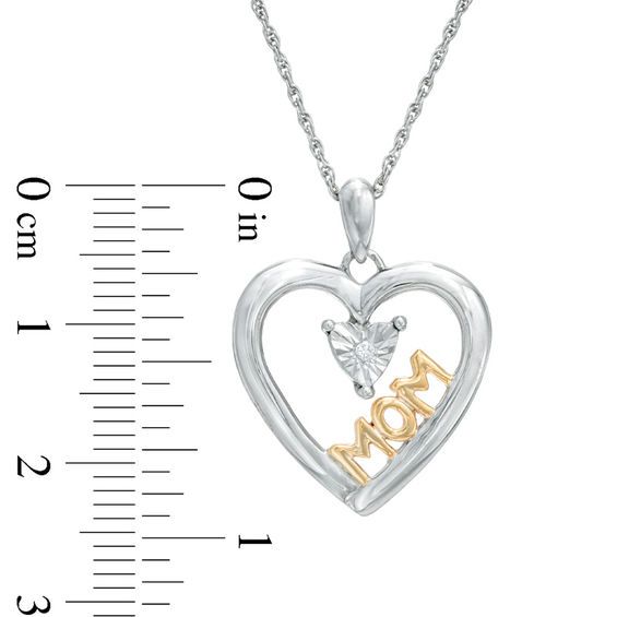 A special gift for mom, this sweet mother's pendant honors everything she means to you. Crafted in sterling silver, this charming open heart is centered with a single shimmering diamond accent. The word "Mom" is sculpted in 14K gold plate along the inside edge, completing the design. Polished to a bright shine, this sleek style suspends along an 18.0-inch rope chain that secures with a spring-ring clasp. Mother's Day Anniversary Jewelry With Diamond Accents, Diamond Accented Jewelry For Anniversary On Mother's Day, White Engraved Heart Necklace For Mother's Day, Mother's Day Anniversary Jewelry With Hallmarks, Engraved White Heart Necklace For Mother's Day, Mother's Day White Sterling Silver Heart Necklace, Heart Necklace With Hallmark For Anniversary And Mother's Day, Mother's Day Jewelry With Diamond Accents, Mother's Day White Jewelry With Diamond Accents