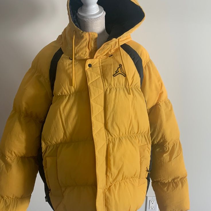 Brand New With Tags Men’s Puffer By Jordan Size L Yellow Puffer Jacket For Cold Weather In Fall, Yellow Hooded Puffer Jacket For Winter, Yellow Hooded Puffer Outerwear, Yellow Winter Outerwear For Streetwear, Yellow Puffer Jacket For Winter, Yellow Winter Streetwear Outerwear, Yellow Casual Puffer Jacket For Spring, Casual Yellow Puffer Jacket For Spring, Yellow Casual Spring Puffer Jacket