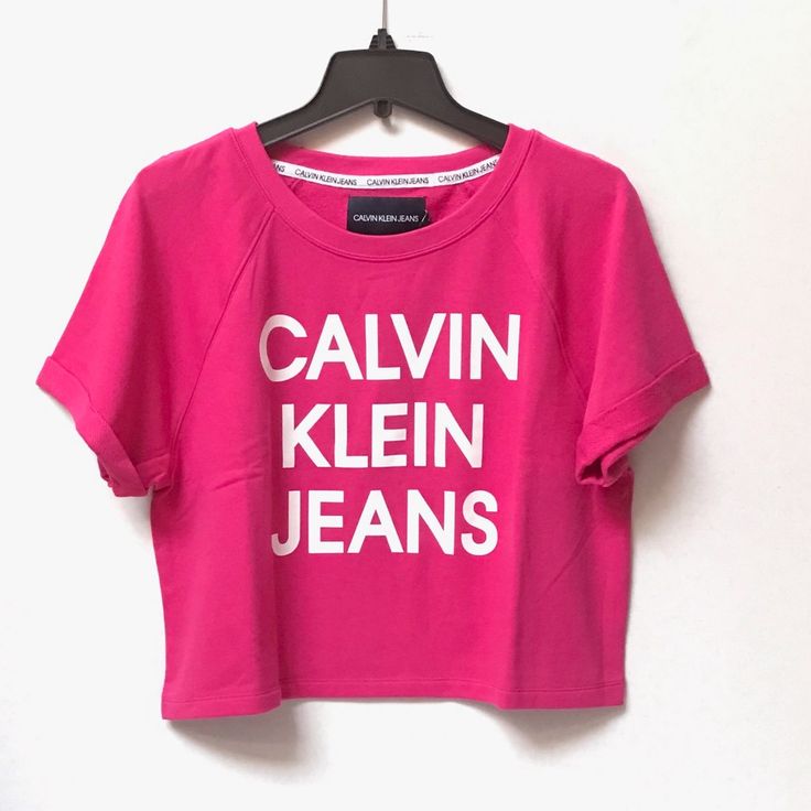 Brand New, Never Worn With Original Tag! Color: 8ee Beetroot Calvin Klein Crew Neck T-shirt For Spring, Calvin Klein Cotton Short Sleeve Tops, Casual Pink Cropped T-shirt With Letter Print, Calvin Klein Fitted Crew Neck Top, Fitted Calvin Klein Crew Neck Top, Trendy Fitted Calvin Klein Tops, Fitted Trendy Calvin Klein Tops, Calvin Klein Stretch Crew Neck Top, Calvin Klein Stretch Cotton Tops