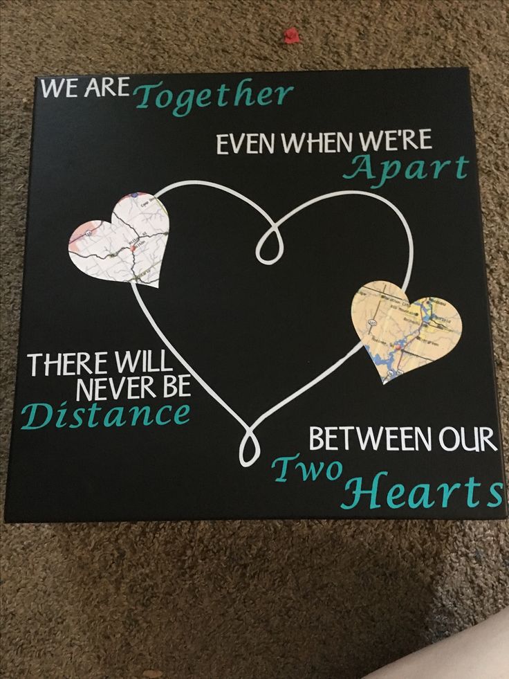 a graduation cap with two hearts and words on it