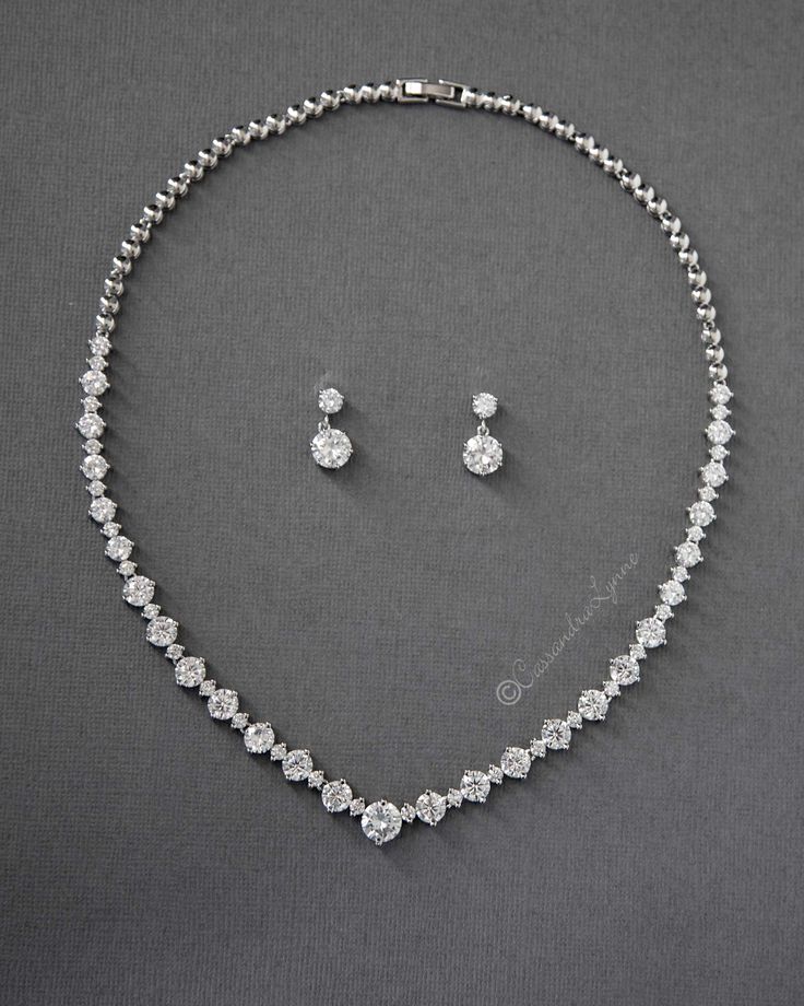 CZ Tennis Necklace and Earring Set White Gold Set Jewelry, Luxury Tennis Necklace With Diamond Accents For Weddings, Silver Diamond Necklace Set, Diamond Necklace Earring Set, Diamond Stone Necklace, Silver Earrings And Necklace Set, Diamond Earrings And Necklace Set, Silver Jewellery For Prom, Wedding Necklace And Earrings