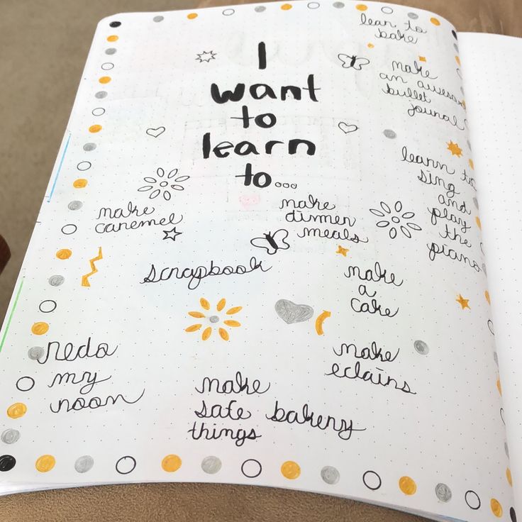 an open notebook with writing on it that says i want to learn to read and write