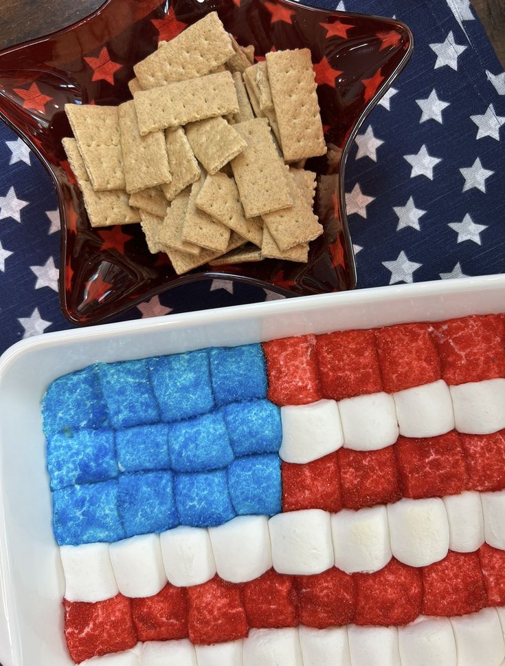 an american flag made out of crackers and marshmallows in a bowl