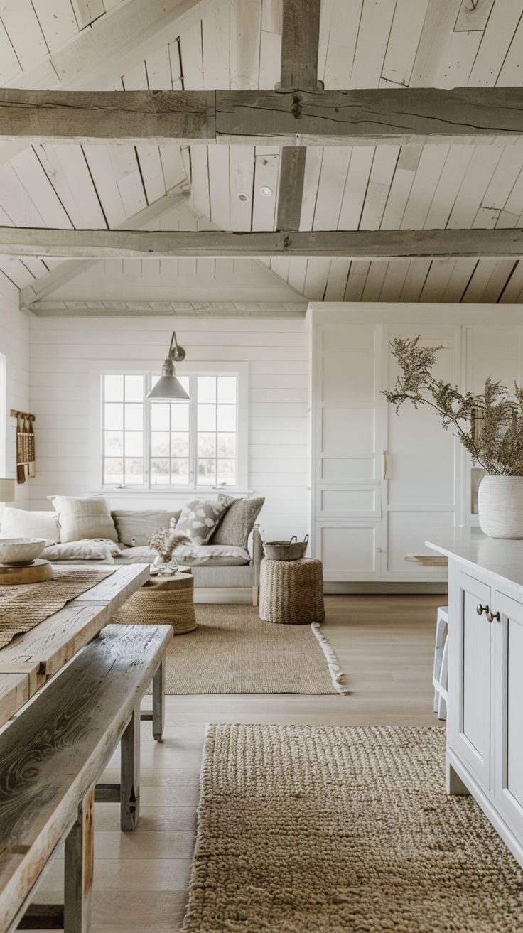 a living room filled with furniture and a wooden table