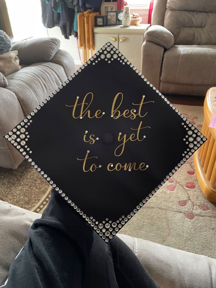 a graduation cap that says the best is yet to come