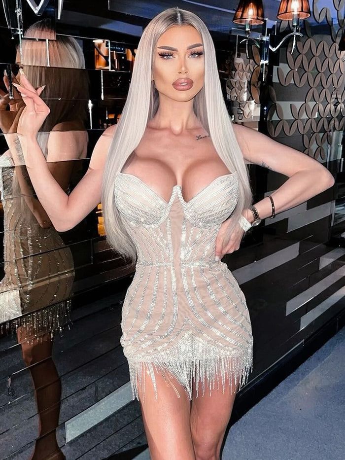 Rhinestone Beige Mini Dress This Rhinestone Beige Mini Dress is a definite showstopper! Featuring embellished corset bodice and tassel fringe detailing across hemline. Best served with a Cosmo and a pair of heels.  Colors: Beige, Black. Sizes: XS-M. 100% PERFECT FIT GUARANTEE You only need to provide us with your heigh Beige Mini Dress, Embellished Corset, Trendy Party Dresses, Designer Party Dresses, Plus Size Party Dresses, Black Party Dresses, Celebrity Design, Sequin Party Dress, Party Dress Short