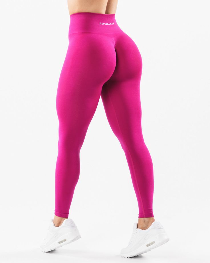 HIGHLIGHTS. High-waisted legging 3-tiered tapered waistband. Seamless, knit fabric. No front seam. Back scrunch seam detail to enhance curves. Leg and glute contouring panels. ForeverKnit core logo on waistband FIT SUGGESTION. This item runs true to Alphalete’s standard seamless fit.. If you are between sizes, we recommend sizing up.. Model is 5’4”/162.5cm, wearing a size XS with a 26”/66cm waist and 39.5”/100.3cm hips. MATERIALS AND WASHING DIRECTIONS. 51% Polyamide, 38% Polyester, 11% Elastane Amplify Leggings, Gym Girlie, Scrunch Leggings, Workout Style, Gym Fits, Ombre Effect, Womens Bras, Pink Leggings, Seamless Leggings