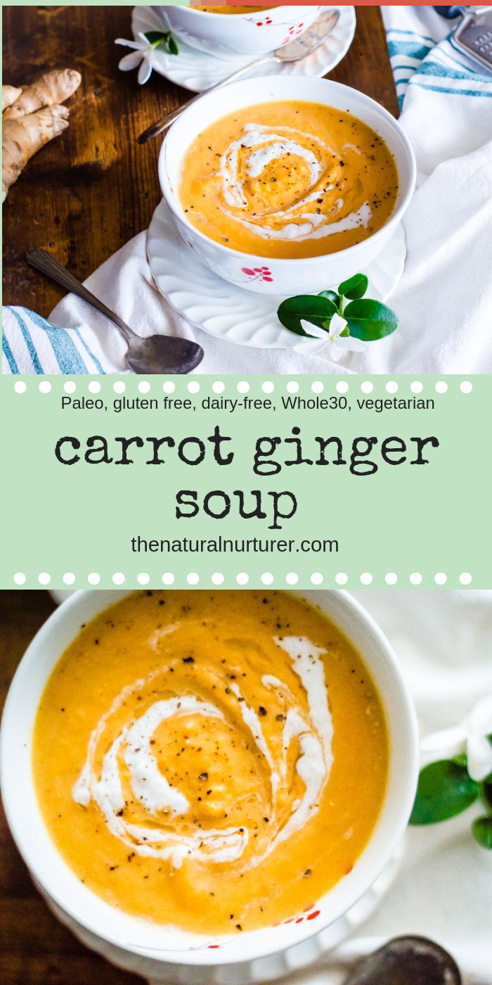 carrot ginger soup in a white bowl on top of a wooden table