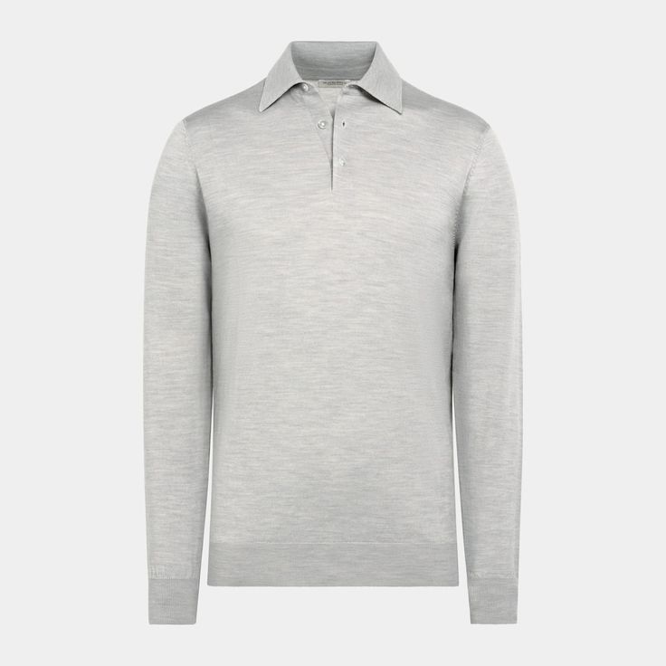 This light grey long sleeve polo is tailored to a slim fit and features a classic button collar, mother of pearl buttons, and a ribbed hem and cuffs. Fitted Long Sleeve Polo Shirt For Formal Occasions, Long Sleeve Polo Shirt With Buttons For Work, Elegant Polo Shirt With Ribbed Collar For Work, Elegant Workwear Polo Shirt With Ribbed Collar, Elegant Polo Shirt For Work, Elegant Fitted Polo Shirt With Placket, Elegant Long Sleeve Polo Sweater With Button Cuffs, Luxury Long Sleeve Polo Sweater For Formal Occasions, Classic Business Polo Shirt