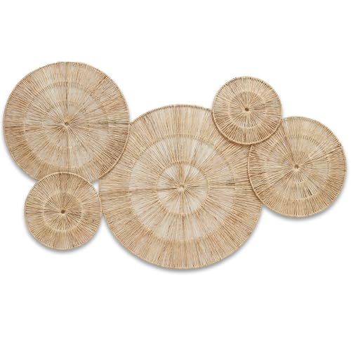 four round wicker coasters in various sizes and shapes, arranged on a white background