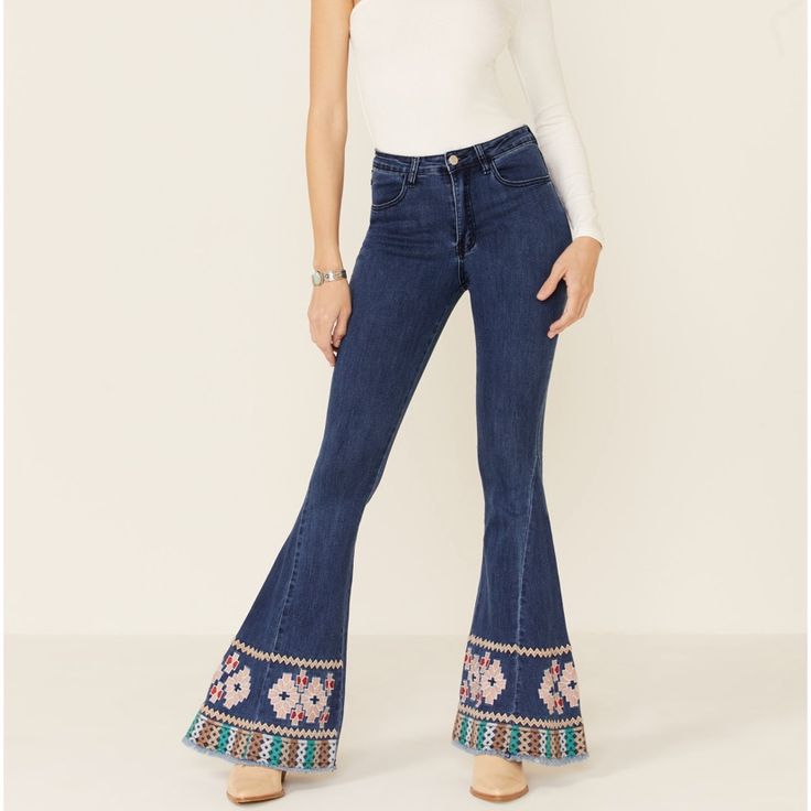 Saints & Hearts Women's Embroidered Hem Flare Jeans Waist 13” Inches Rise 10” Inches Inseam 34” Inches Bohemian Floral Embroidered Bottoms For Festival, Bohemian Bottoms With Embroidered Hem, Bohemian Embroidered Denim Bottoms, Bohemian Denim Bottoms With Floral Embroidery, Fitted Blue Jeans With Floral Embroidery, Fitted Embroidered Jeans For Summer, Embroidered Fitted Jeans For Summer, Fitted Embroidered Summer Jeans, Bohemian Embroidered Bottoms For Spring