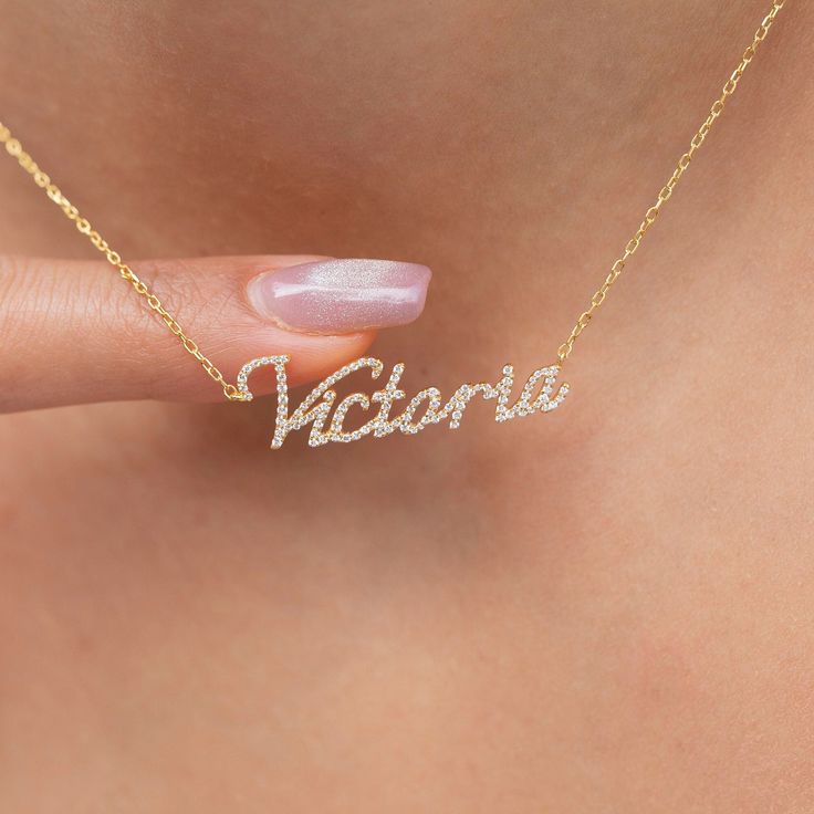 This 14k personalized diamond name necklace is the perfect gift for the bridal party, someone special, or yourself. How to order 1- Pick the fonts you like and send us a message 2- We will send you a picture of your name with the fonts you chose 3- If you like it any of them, place your order. 4- We send a final 3d mock up for approval. 5- Once approved we go ahead and finish your necklace. __________________________________________ M A T E R I A L & L E N G T H Available in 14k Yellow Gold, 14k Personalized Diamond Necklace For Birthday, Personalized Cubic Zirconia Necklaces, Personalized Cubic Zirconia Necklace For Special Gifts, Classic Personalized Cubic Zirconia Necklaces, Classic Personalized Cubic Zirconia Necklace, Elegant Custom Name Letter Necklace, Classic Diamond Name Necklace For Anniversary, Diamond Name Necklace For Weddings, Classic Diamond Initials Name Necklace