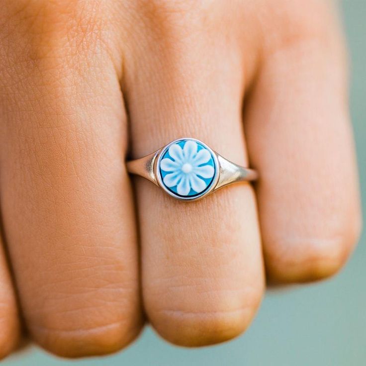 We're getting all the Pura Vida vibes from our new Cameo Ring! This island oasis of a ring comes with a light blue cameo flower and a silver finish that pairs perfectly with our Cameo Bracelets in any color! - Brass base with rhodium plating- Cameo flower dimensions: 9mm diameter- "pura vida" stamped on inside front of ring- Exchanges only Knockaround Sunglasses, Howlite Rings, Spy Sunglasses, Cameo Bracelet, Ring Exchange, Pura Vida Bracelets, Rainbow Rings, Cameo Ring, Sun With Sunglasses