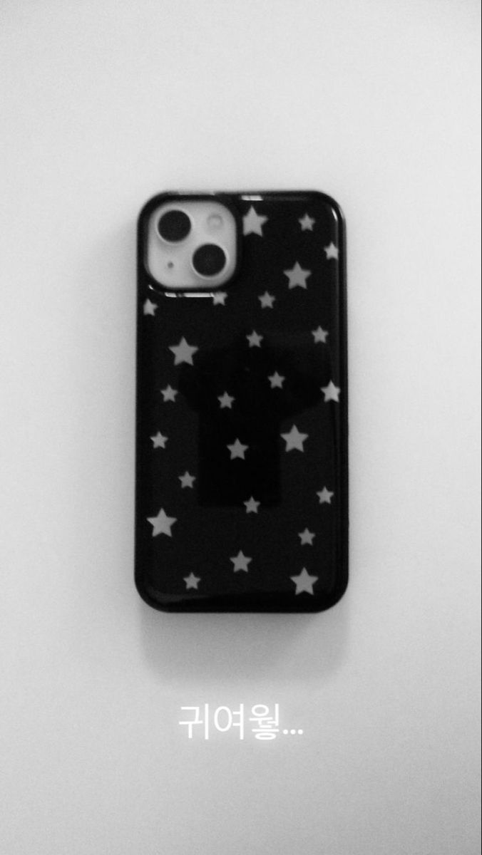 an iphone case with white stars on it