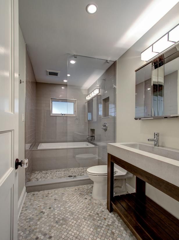 a bathroom with a sink, toilet and bathtub